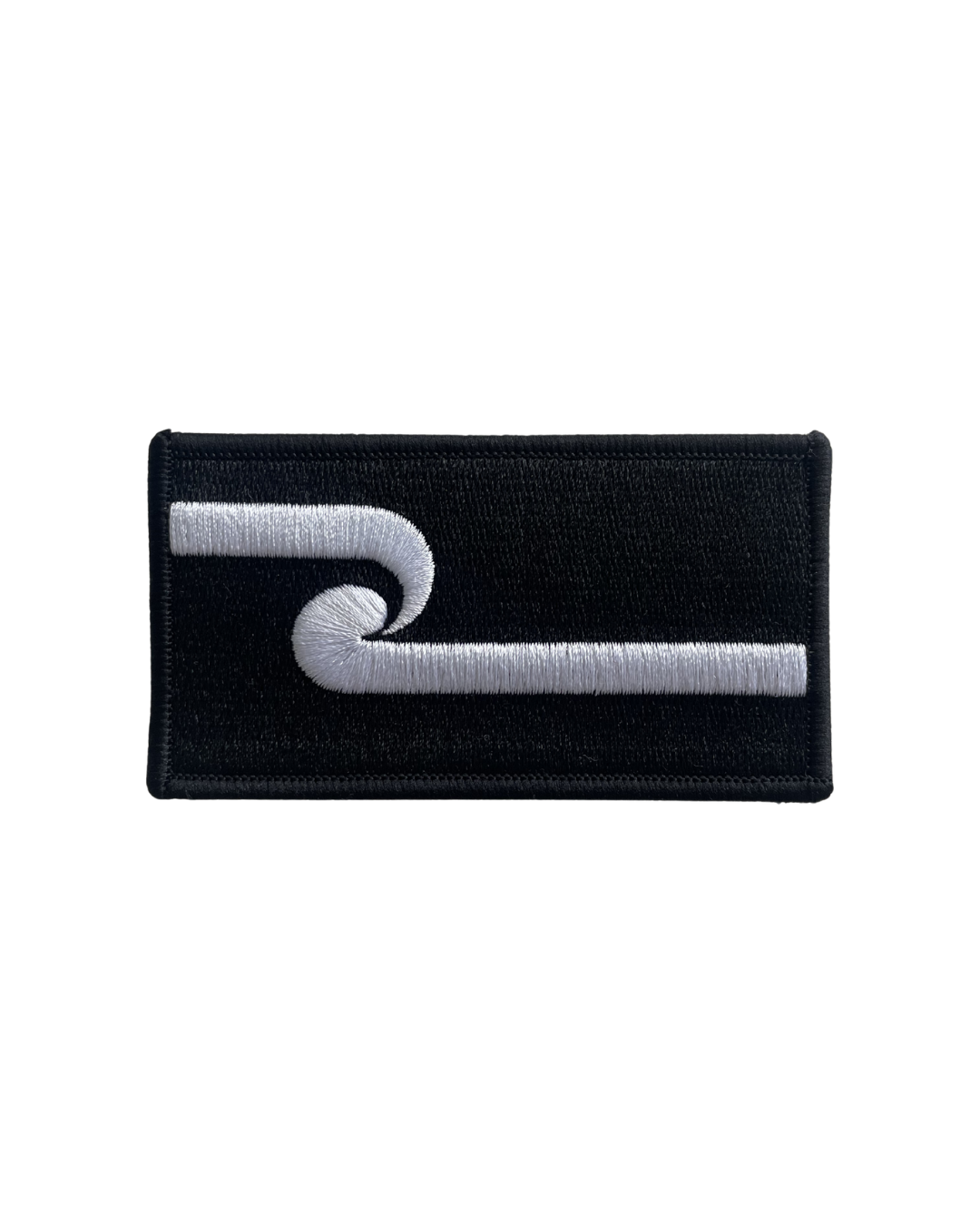 Embroidered maori patch for hybrid backpack.